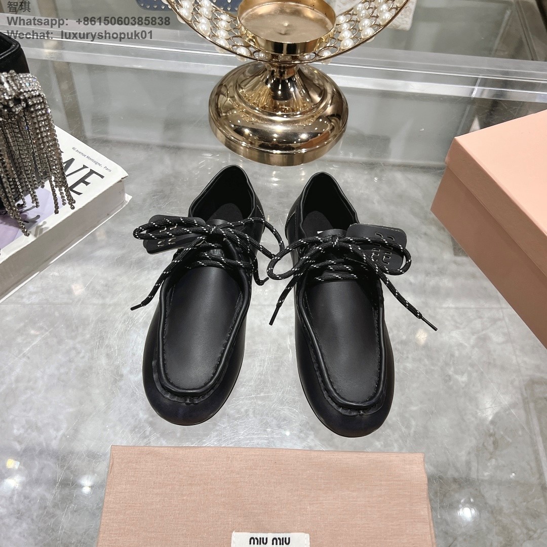 Miu Miu logo-embossed suede loafers tie-detailing round toe Women flat shoes