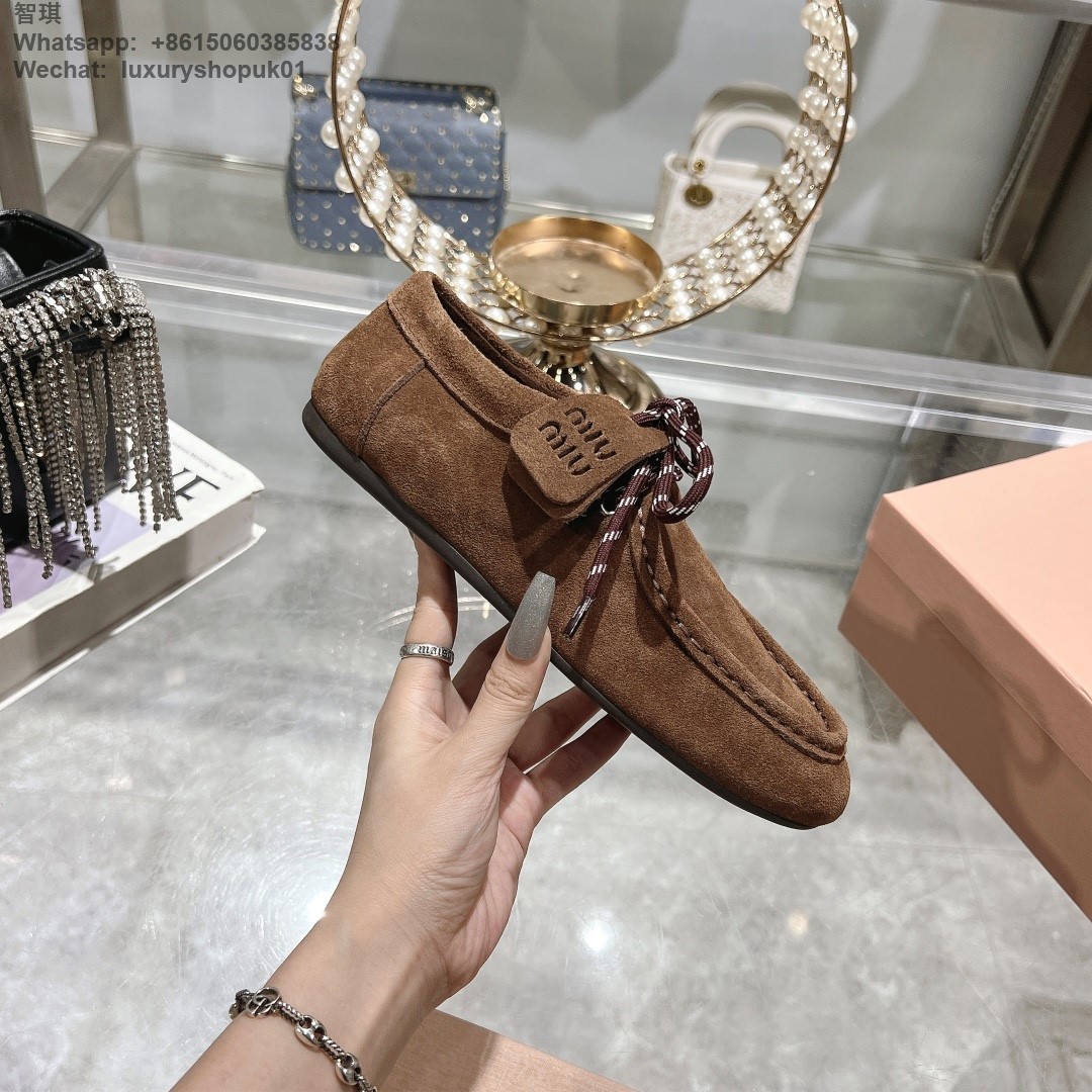 Miu Miu logo-embossed suede loafers tie-detailing round toe Women flat shoes