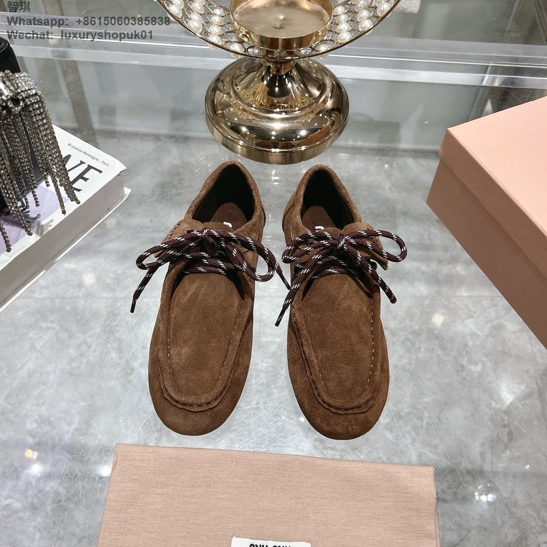 Miu Miu logo-embossed suede loafers tie-detailing round toe Women flat shoes