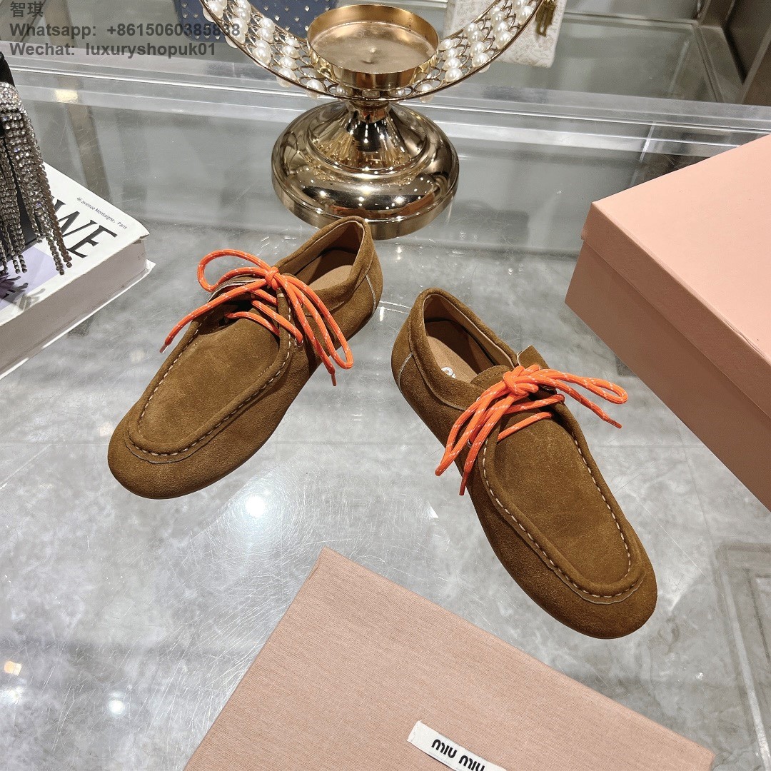 Miu Miu logo-embossed suede loafers tie-detailing round toe Women flat shoes