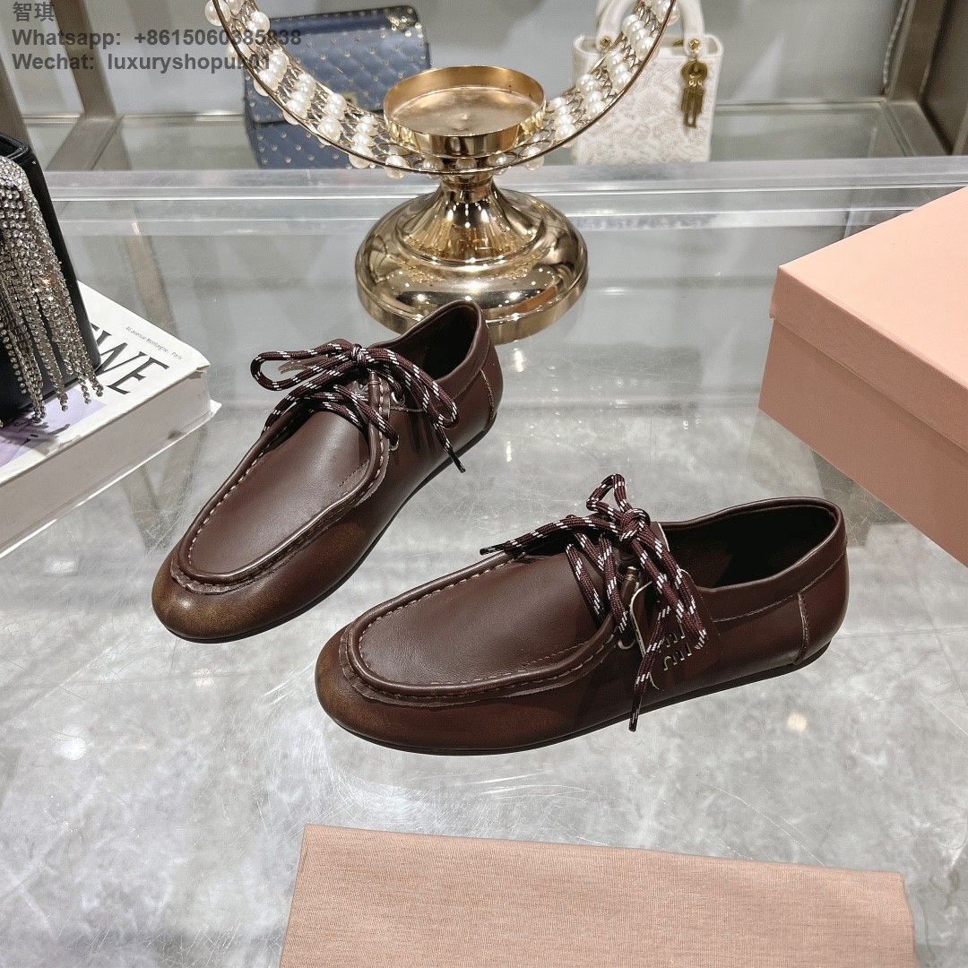 Miu Miu logo-embossed suede loafers tie-detailing round toe Women flat shoes