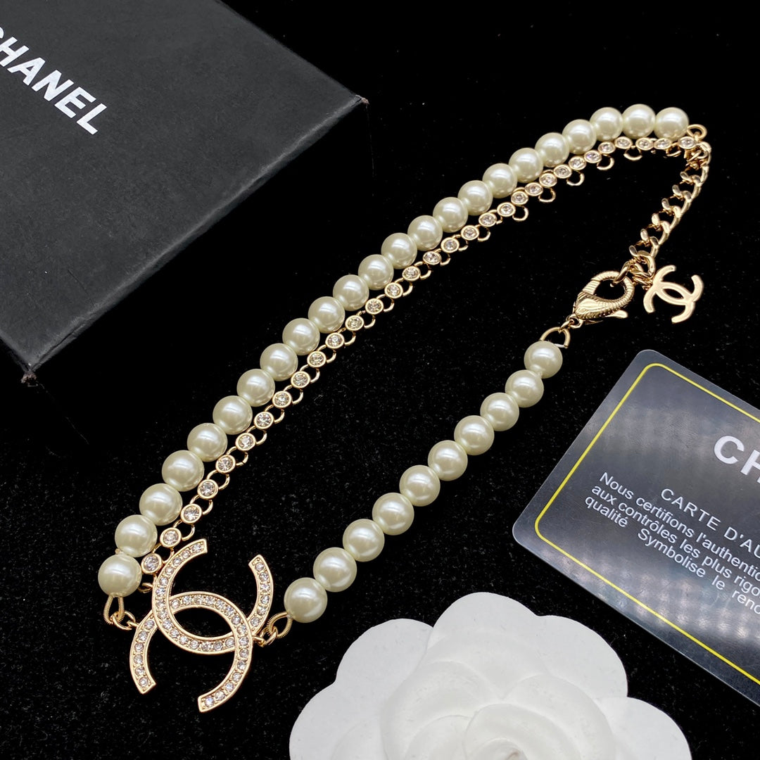 CHANEL Luxury pearl and diamond necklace + bracelet