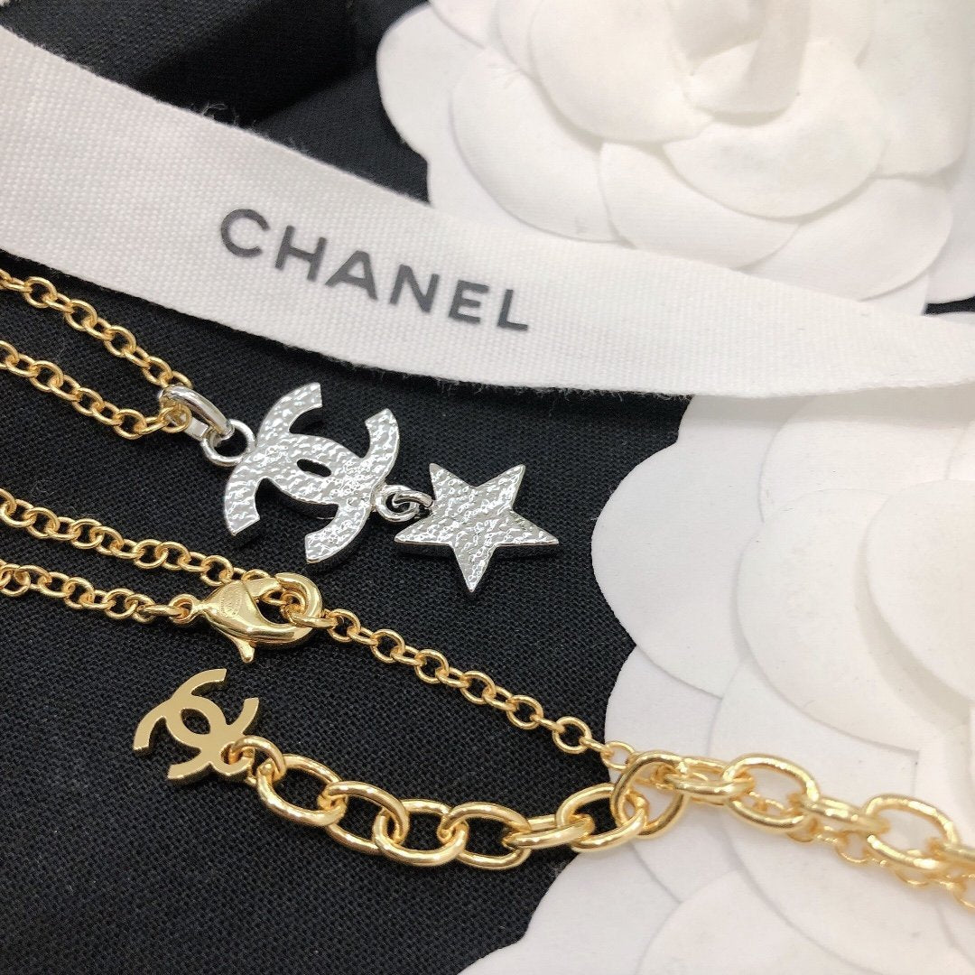 CHANEL Star Rhinestone Gold And Silver Necklace