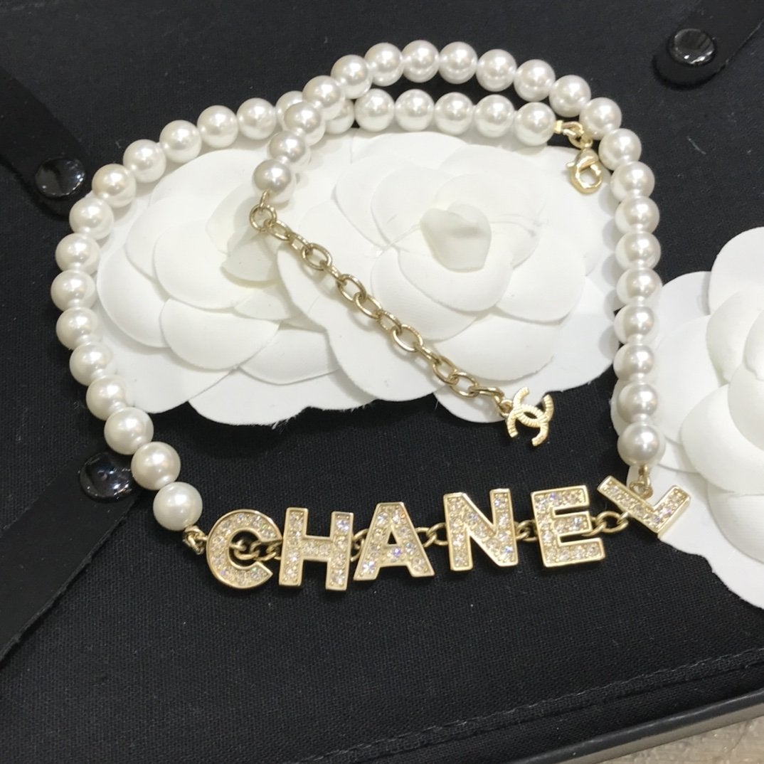 CHANEL New Letter Pearl Necklace