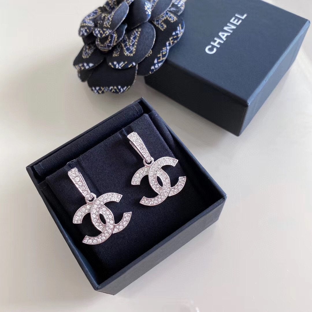 CHANEL Elegant Rhinestone Double C Pendant Earrings