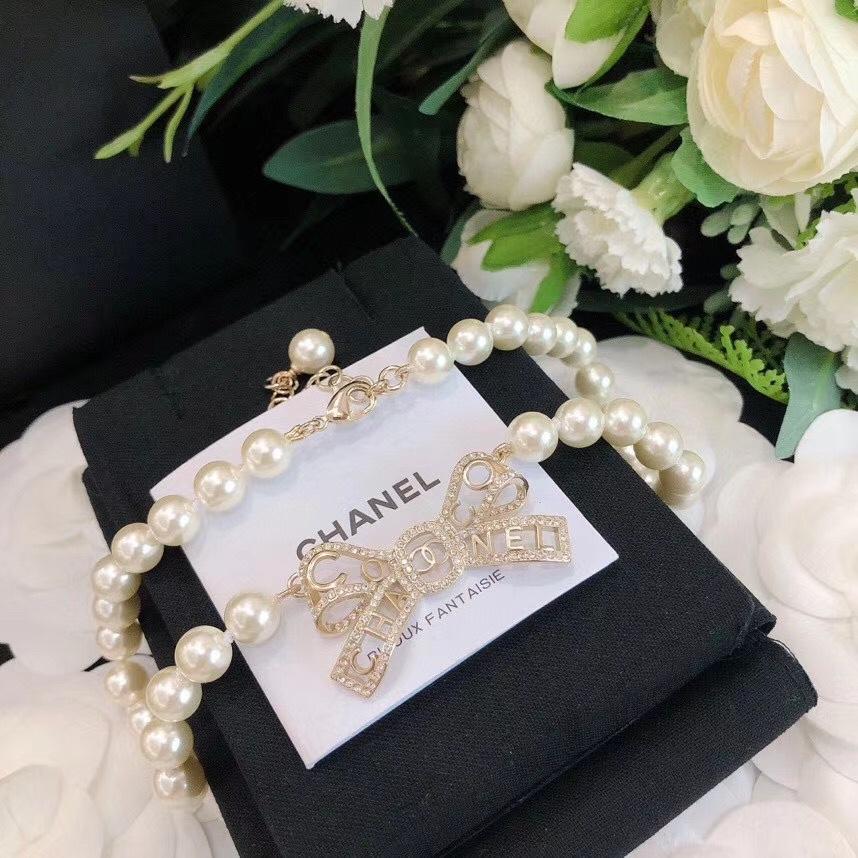 CHANEL New Letter Hollow Bow Pendant Necklace