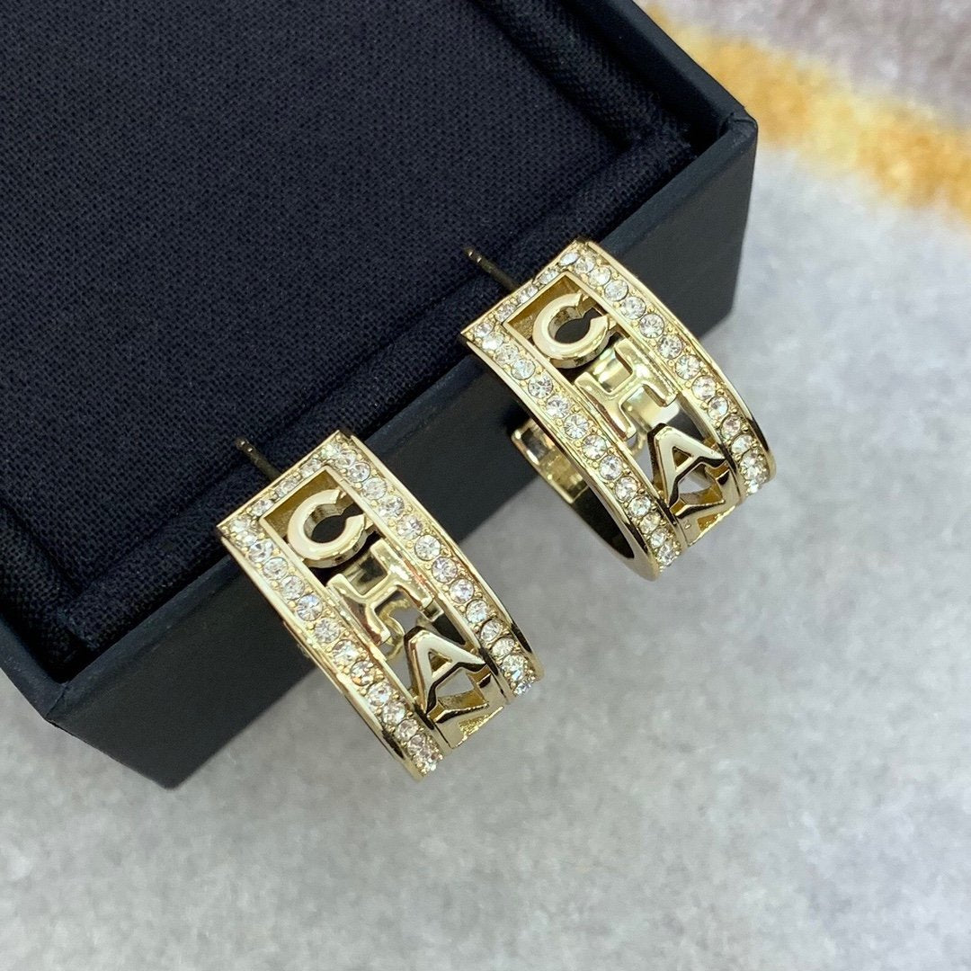 CHANEL Fashion Hollow Light Gold Letter Earrings