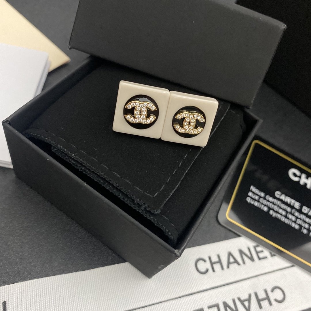 CHANEL Fashion enamel black and white earrings