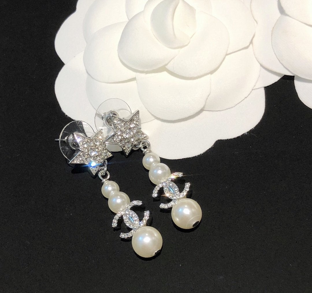 CHANEL Elegant Pearl Crystal Star Pendant Earrings