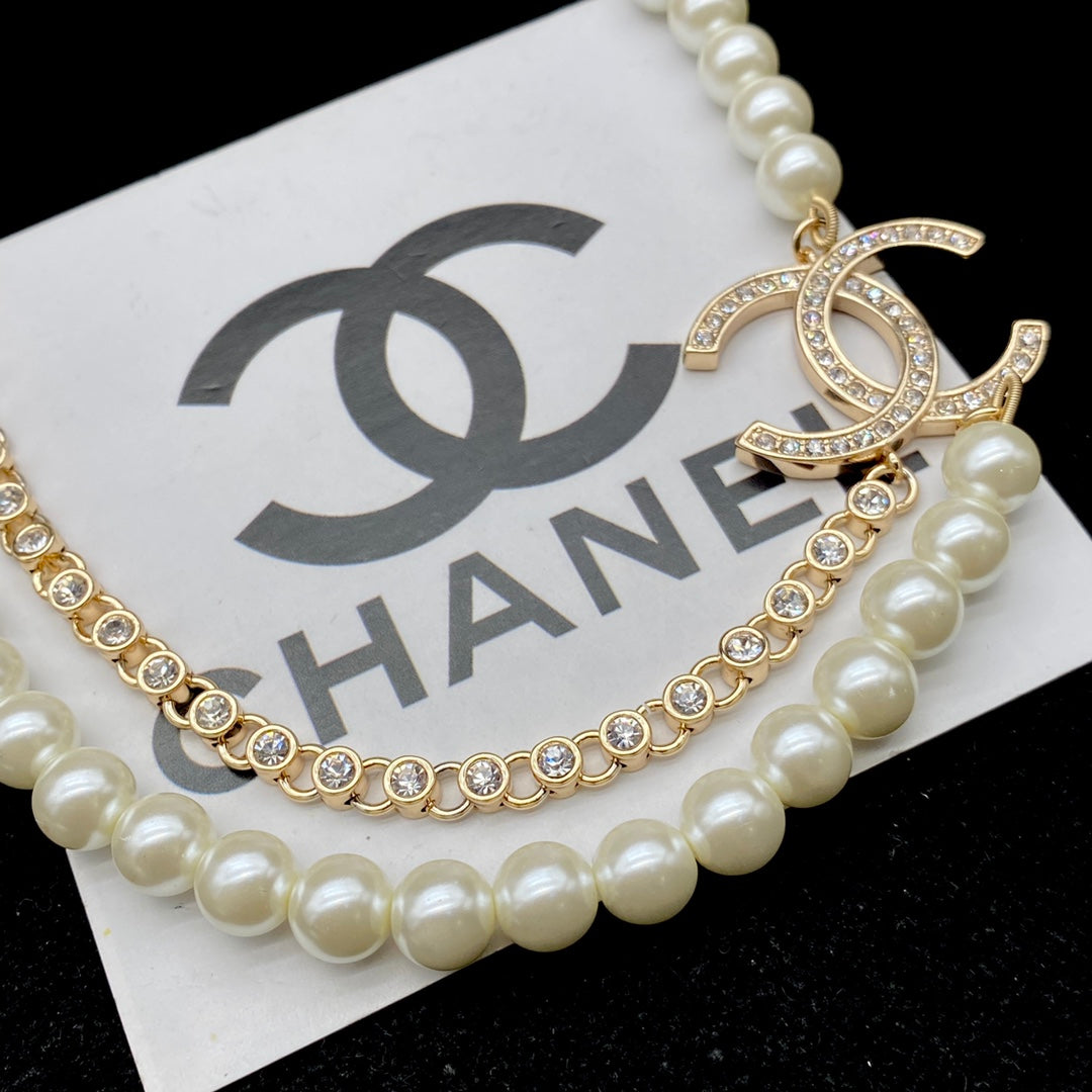 CHANEL Luxury pearl and diamond necklace + bracelet
