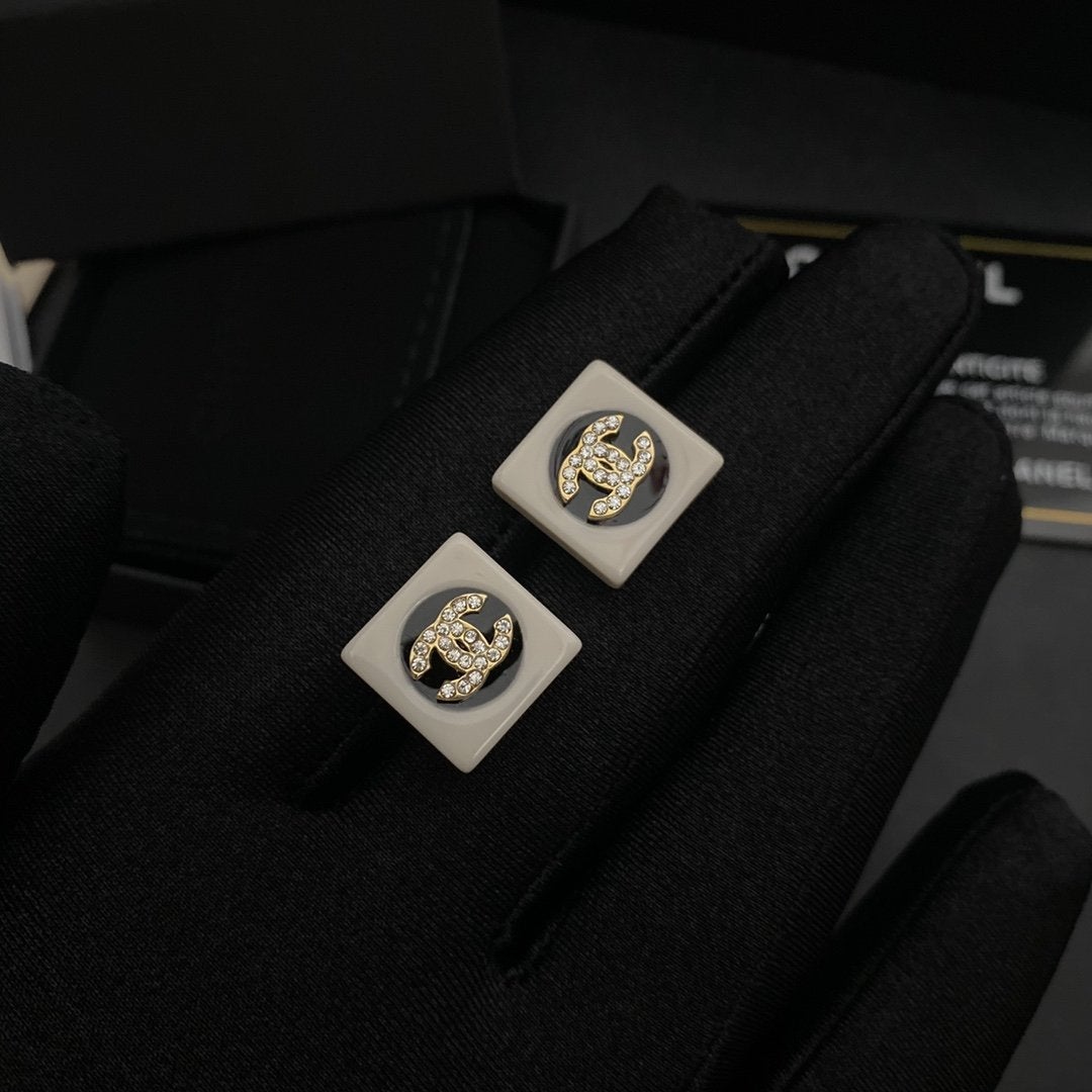 CHANEL Fashion enamel black and white earrings