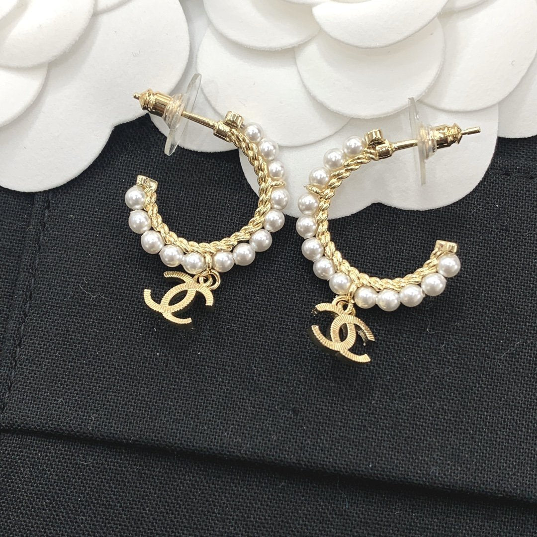 CHANEL Elegant Pearl Double C Pendant Earrings