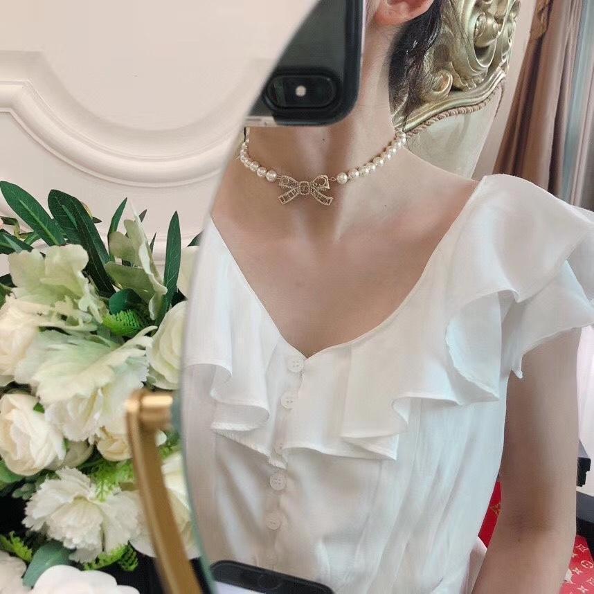 CHANEL New Letter Hollow Bow Pendant Necklace