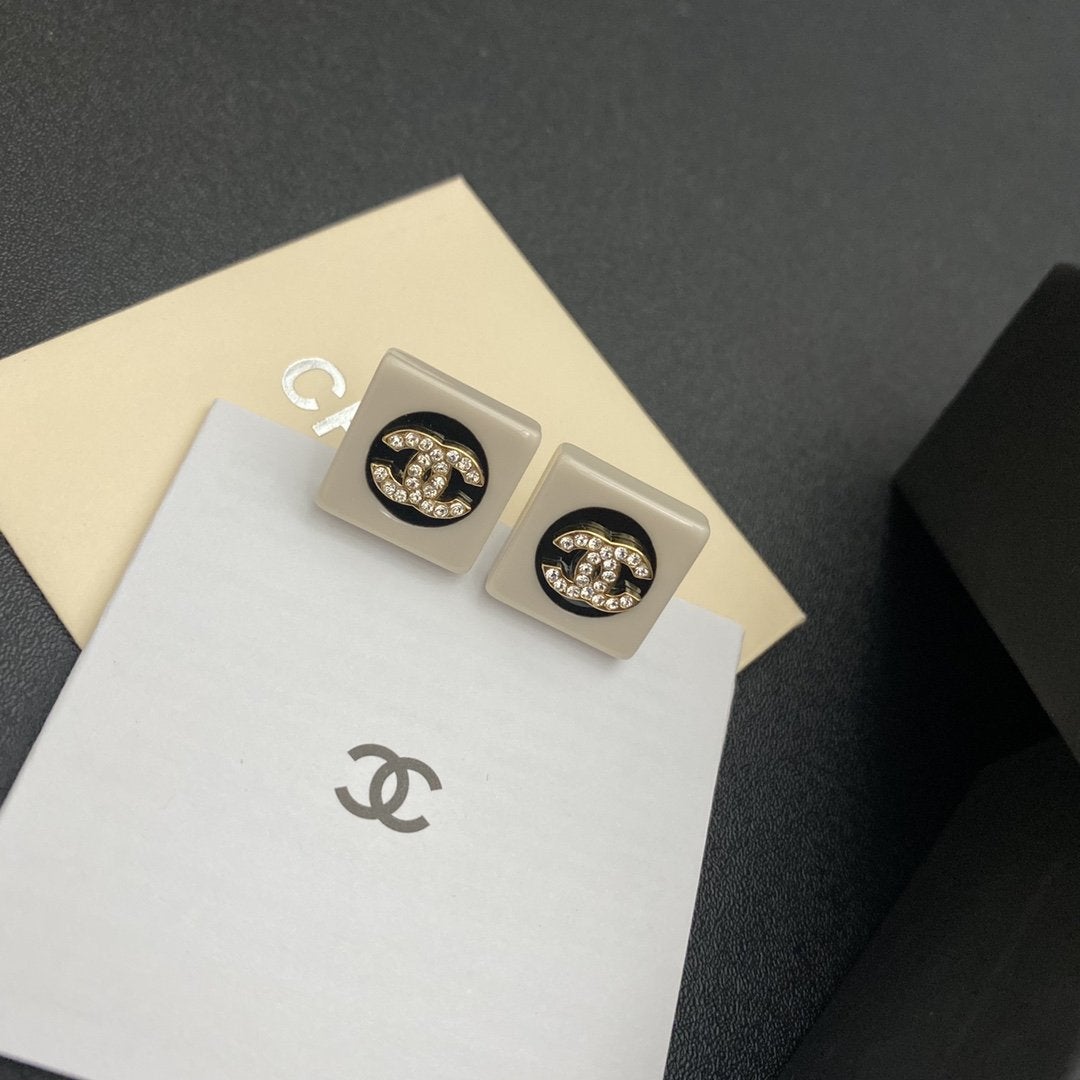 CHANEL Fashion enamel black and white earrings