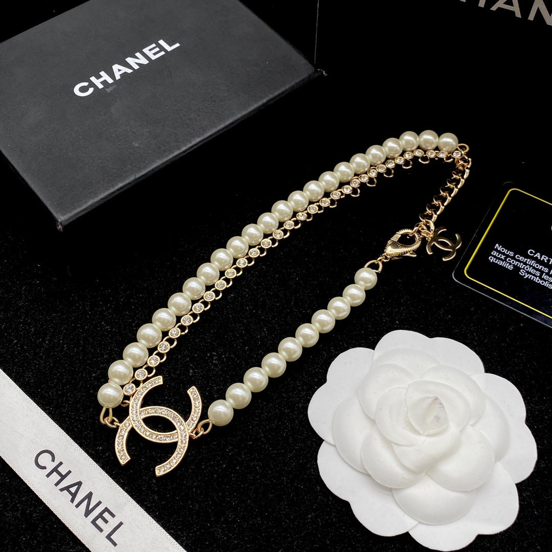 CHANEL Luxury pearl and diamond necklace + bracelet