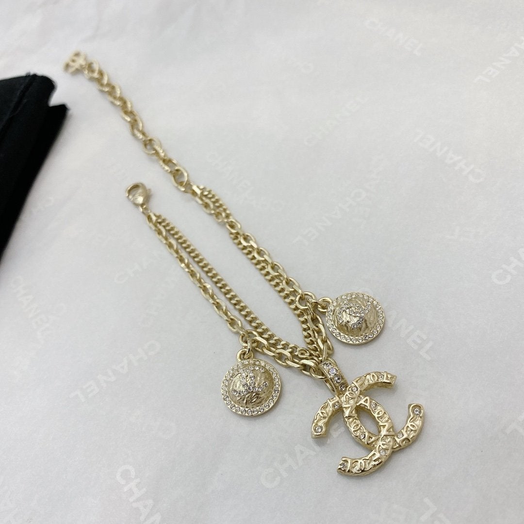 CHANEL Letter Embossed Rhinestone Bracelet