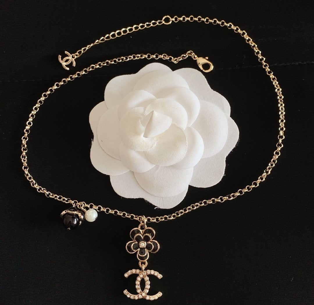 CHANEL Elegant Camellia Pendant Necklace