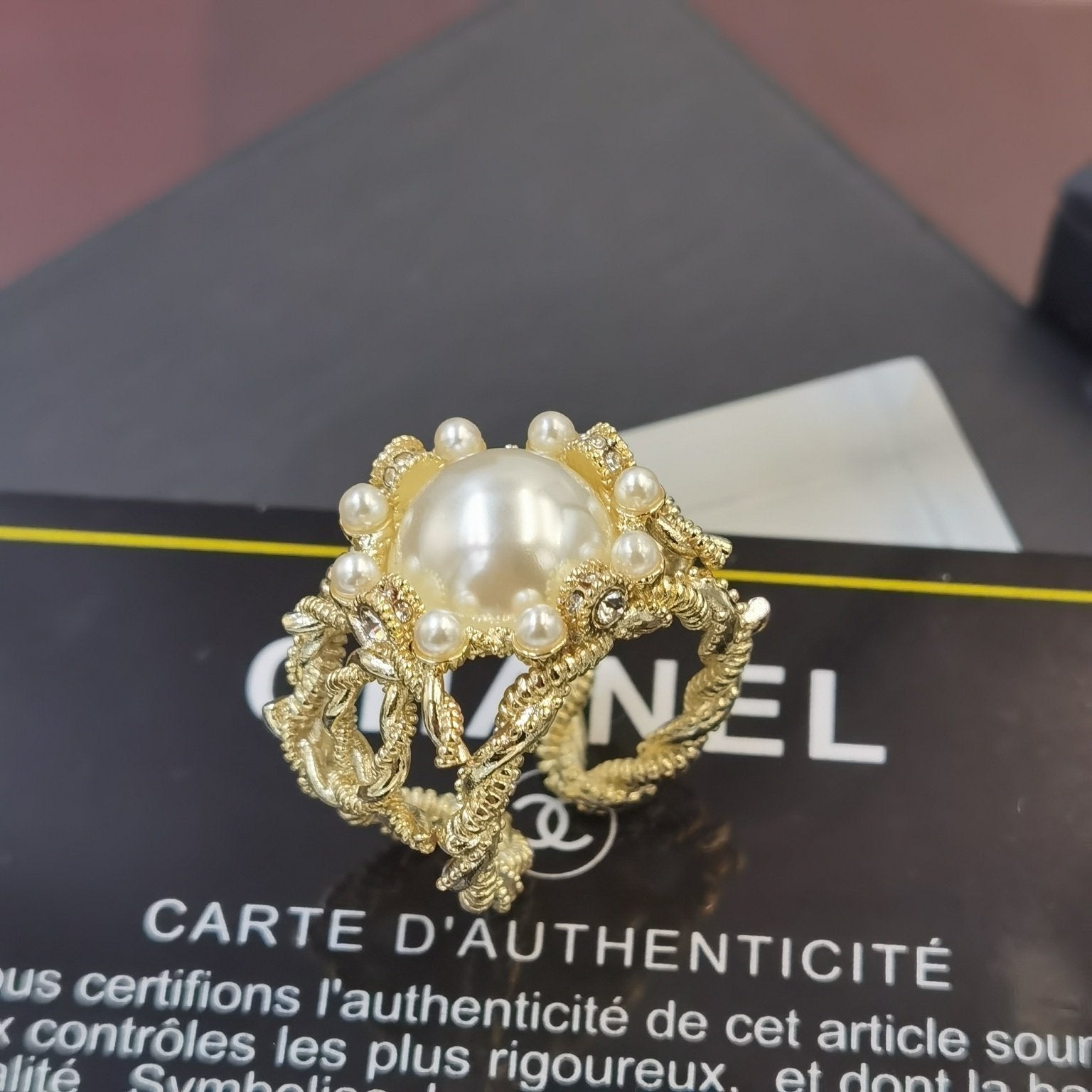 CHANEL Luxury Carved Textured Pearl Open Ring