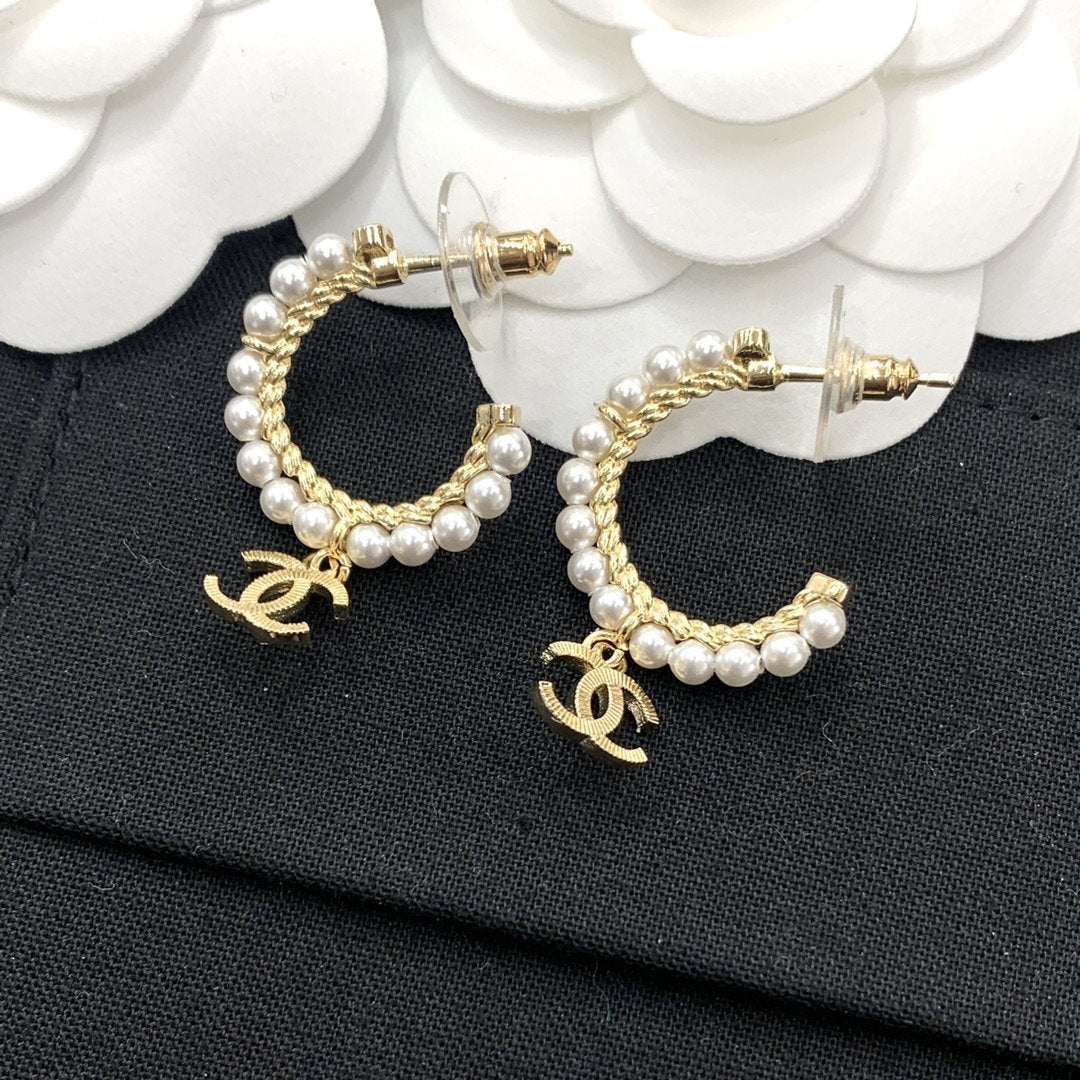 CHANEL Elegant Pearl Double C Pendant Earrings