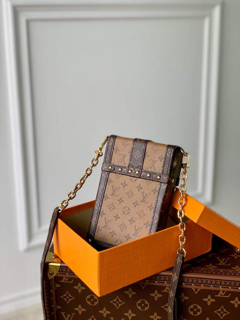 LV M63913 Louis Vuitton Vertical Trunk Pochette Bag Brown