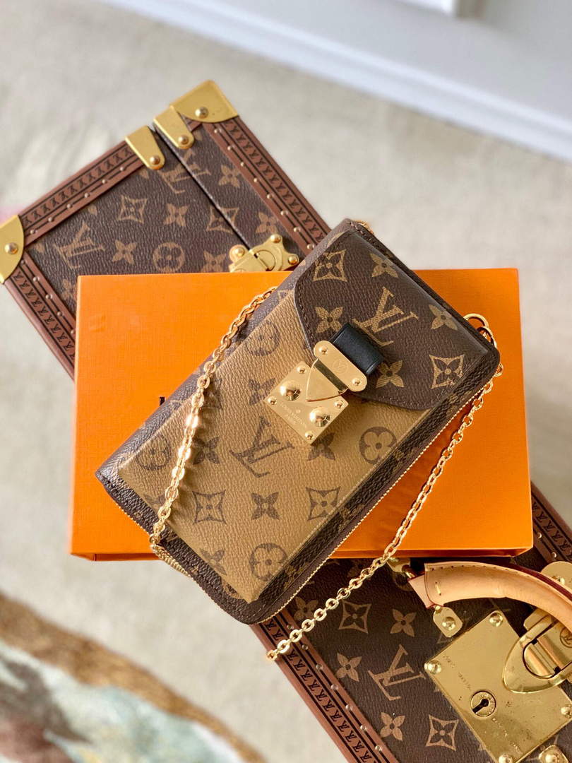LV M63913 Louis Vuitton Vertical Trunk Pochette Bag