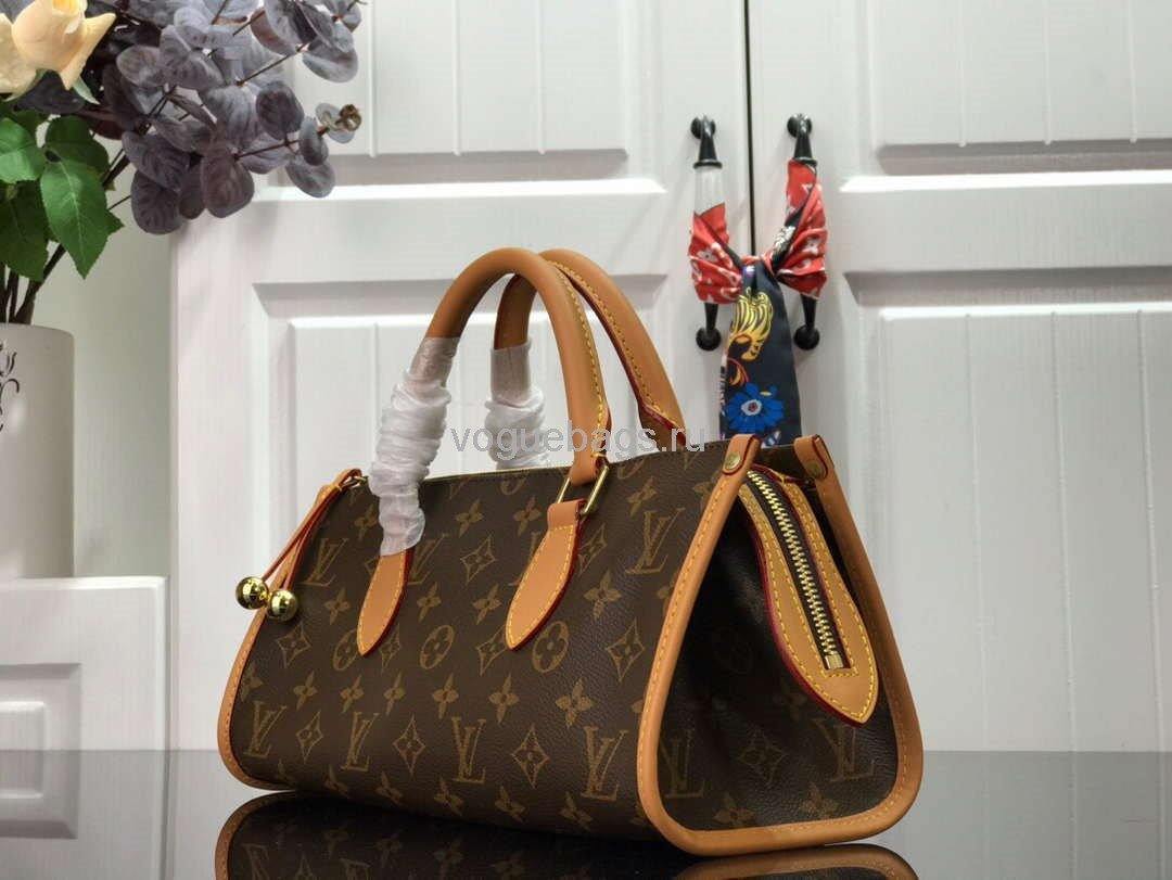 LV M40009 Louis Vuitton Medieval Series Golden Ball Triangle Monogram Bag
