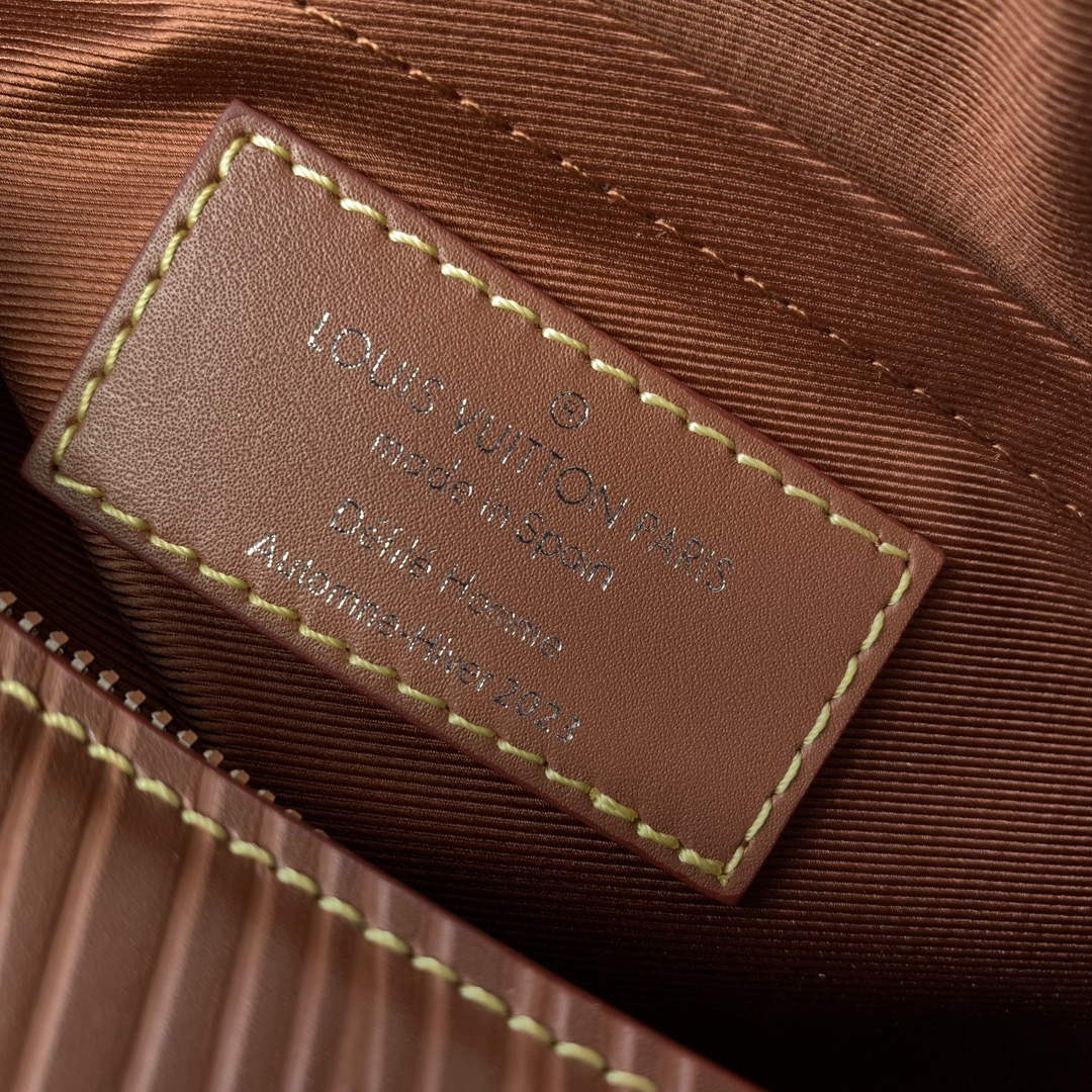 LV M23092 Louis Vuitton Soft Polochon Cross-body Bag Cognac