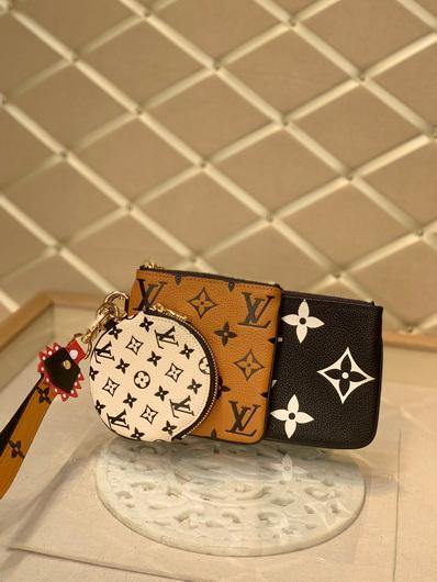 LV M69516 Louis Vuitton Crafty Trio Pouch Monogram