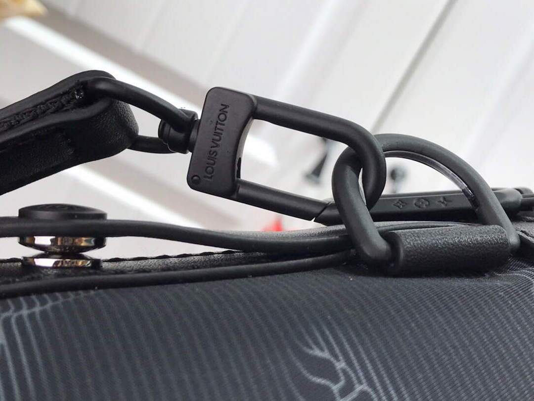 LV M45604 Louis Vuitton 2054 Expandable Polochon Bag Black