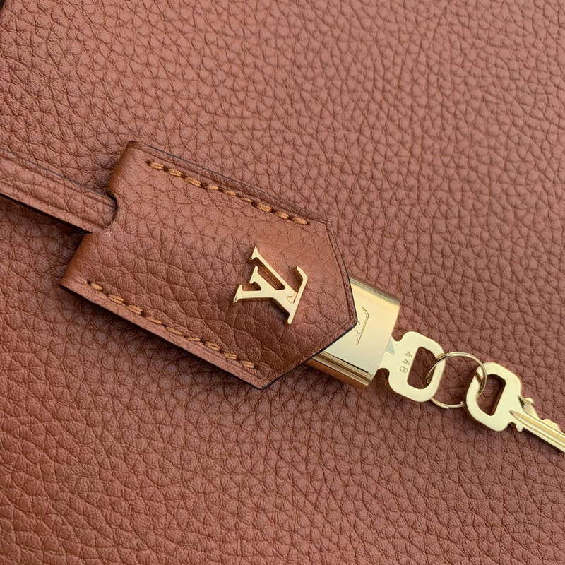 LV M22925 Louis Vuitton Lock It MM Bag Gold
