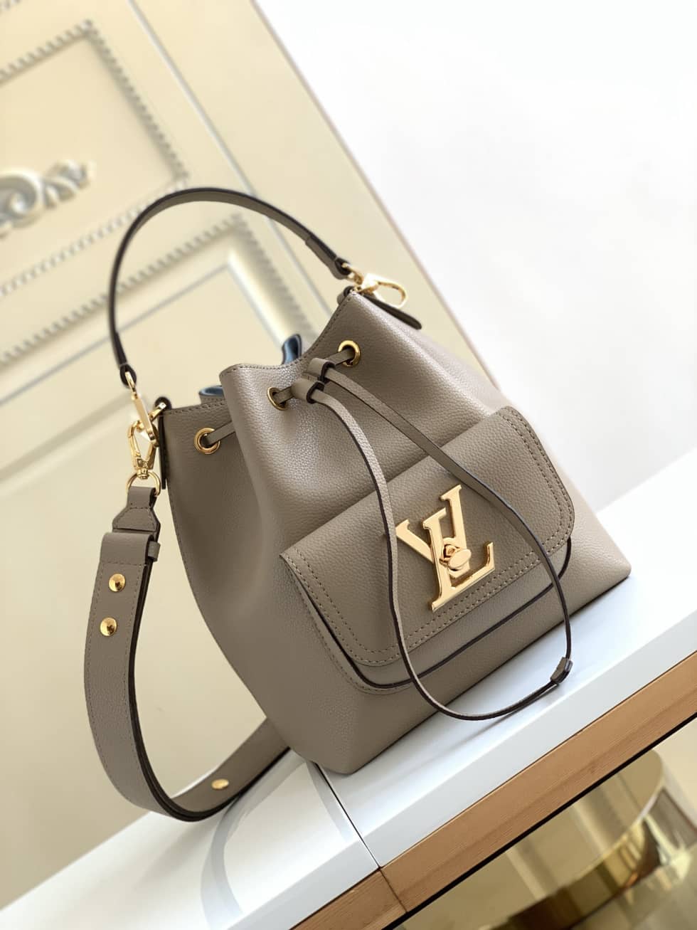 Louis Vuitton Lockme Grained Calf Leather Greige M57688 Replica Bucket Bag