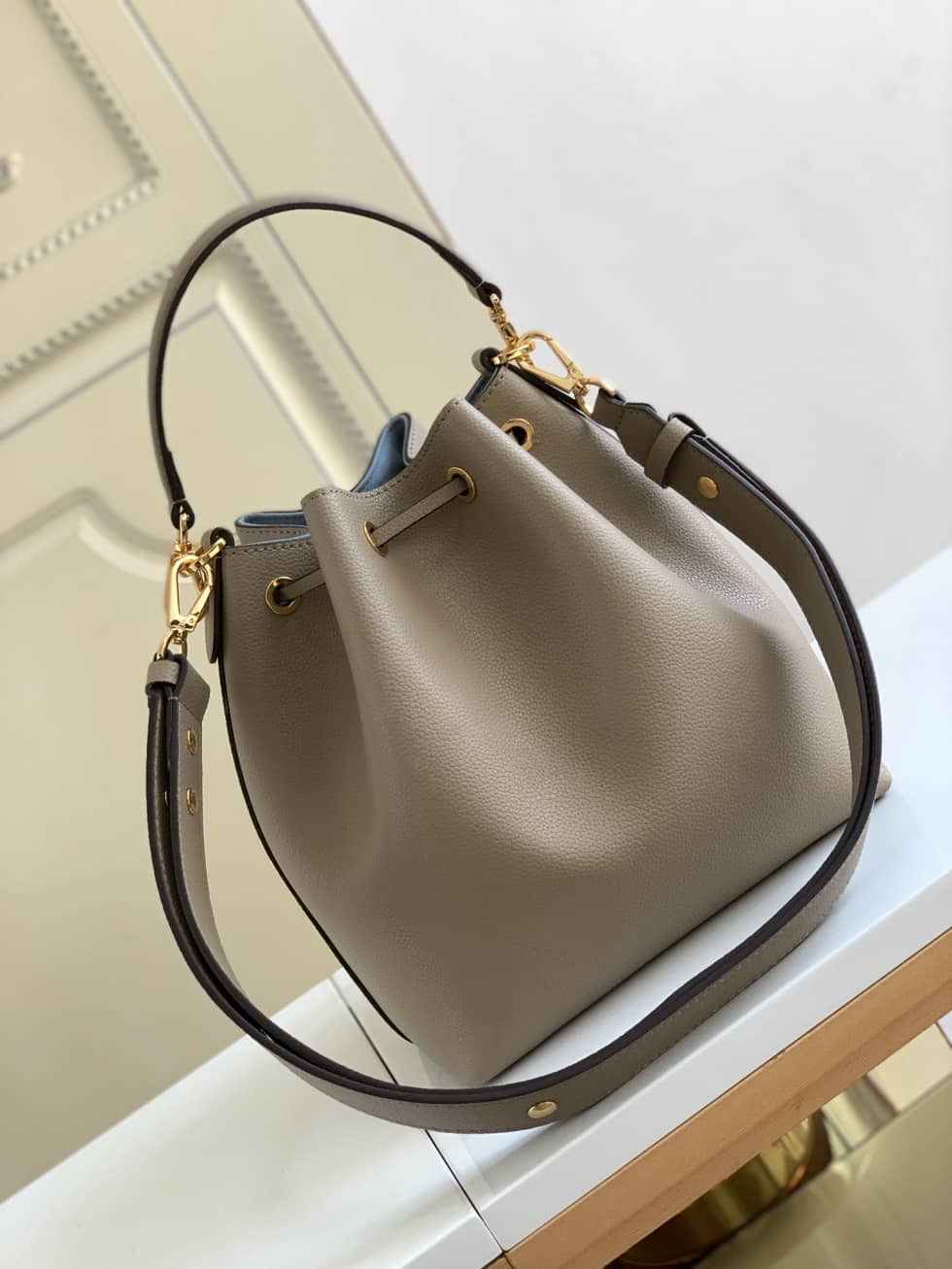 Louis Vuitton Lockme Grained Calf Leather Greige M57688 Replica Bucket Bag