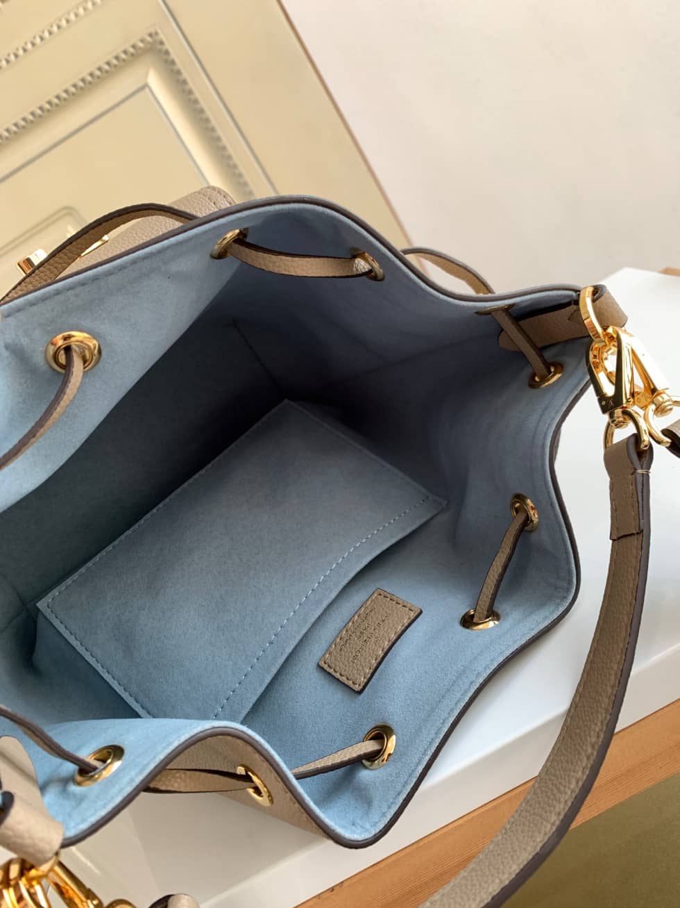 Louis Vuitton Lockme Grained Calf Leather Greige M57688 Replica Bucket Bag