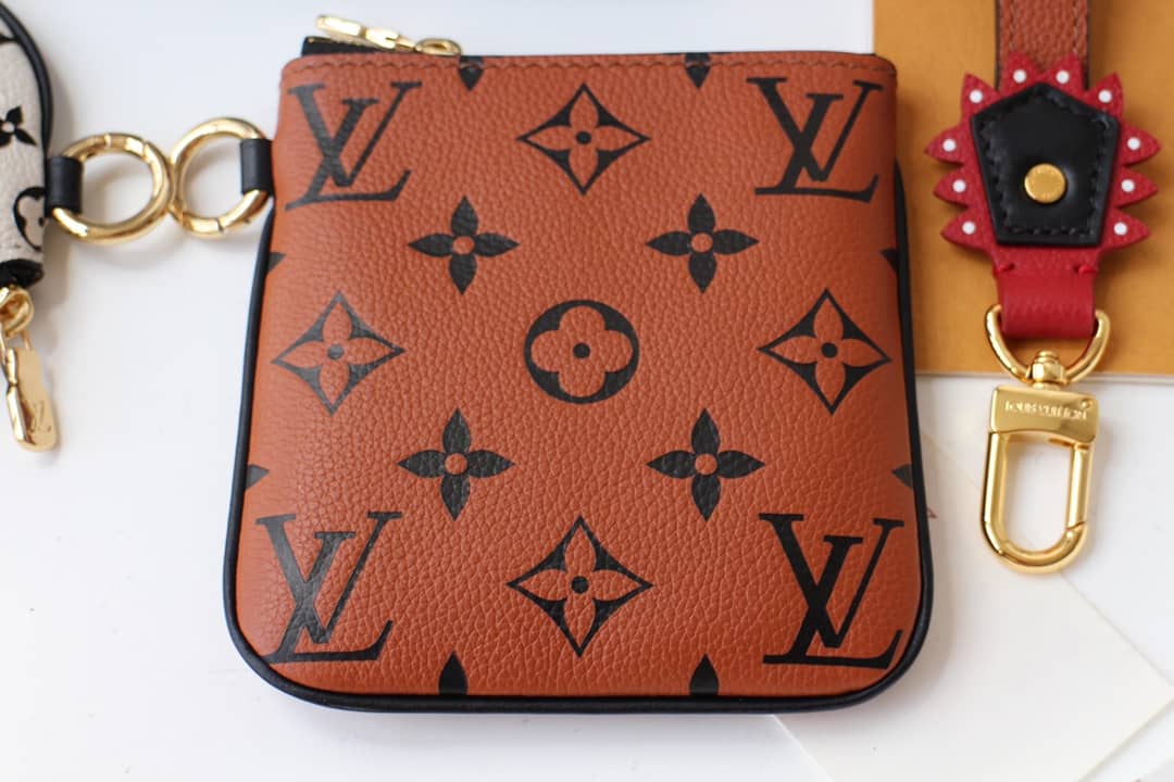 Louis Vuitton Crafty Trio Pouch Monogram Empreinte Replica M69516