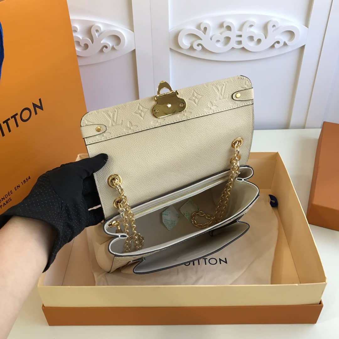 Louis Vuitton Monogram Empreinte Vavin PM Chain Replica Shoulder Bag Cream M44151