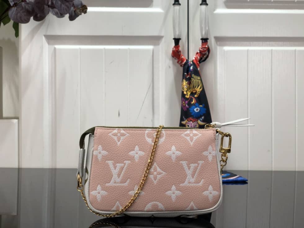 Louis Vuitton Monogram Empreinte Leather Mini Pochette Accessoires M81284 Replica