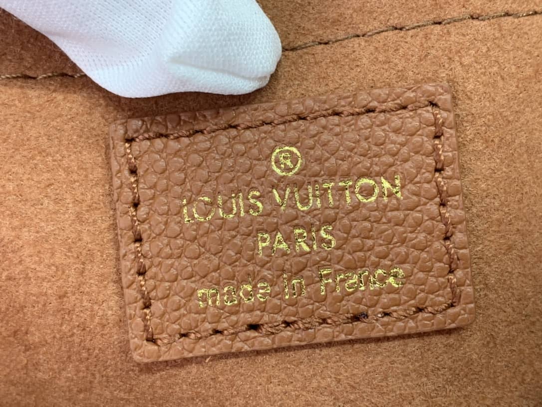 Louis Vuitton Pochette Monogram Empreinte Cowhide Leather Replica Crossbody Bag M45777