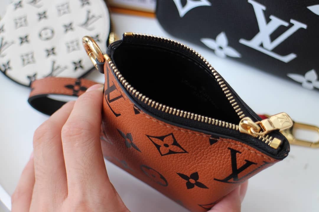 Louis Vuitton Crafty Trio Pouch Monogram Empreinte Replica M69516