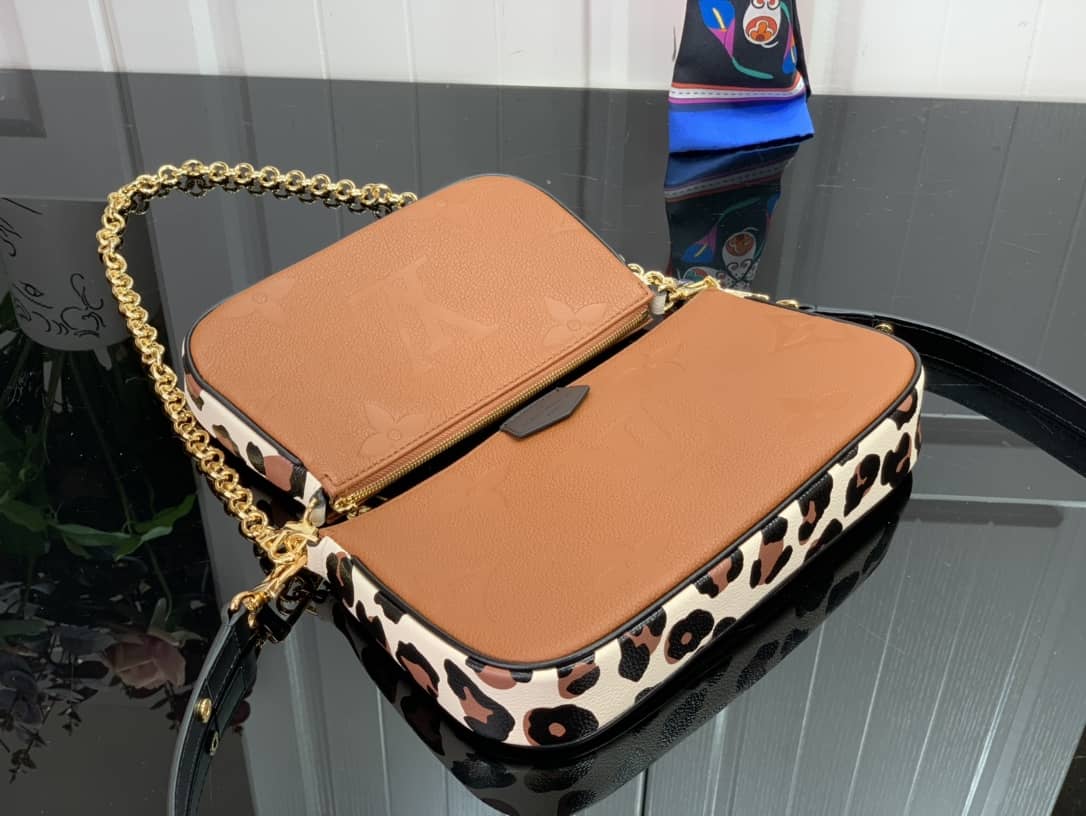 Louis Vuitton Pochette Monogram Empreinte Cowhide Leather Replica Crossbody Bag M45777