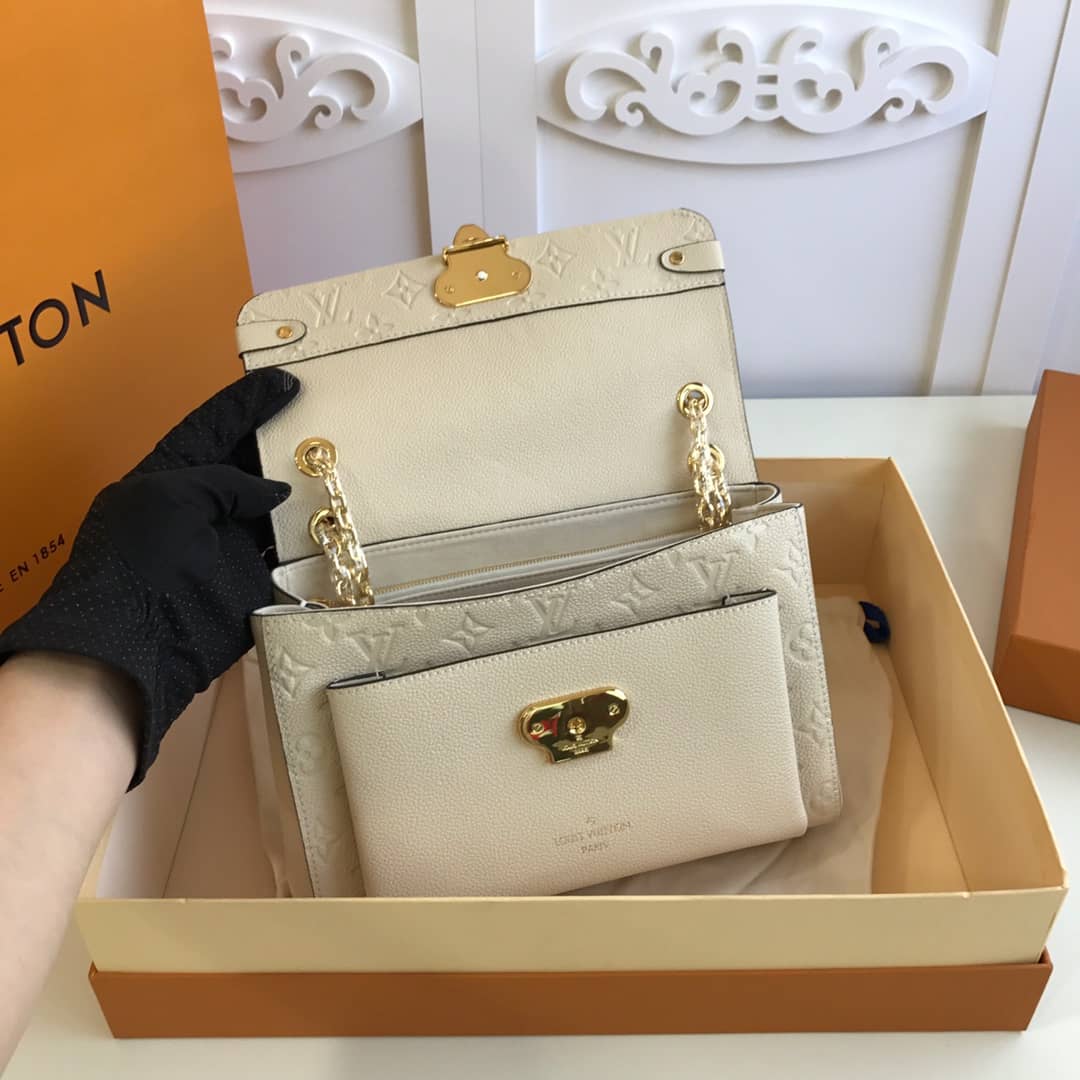 Louis Vuitton Monogram Empreinte Vavin PM Chain Replica Shoulder Bag Cream M44151