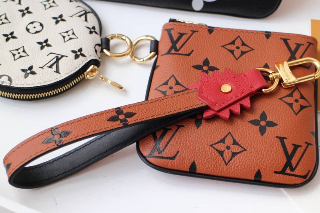Louis Vuitton Crafty Trio Pouch Monogram Empreinte Replica M69516