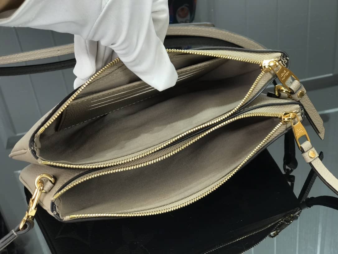 Louis Vuitton Double Zip Monogram Empreinte Leather Replica Pochette M80084