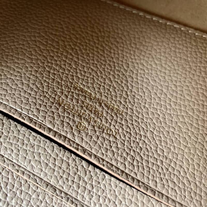 Louis Vuitton Pochette Melanie MM Monogram Empreinte Replica Clutch Apricot M68705