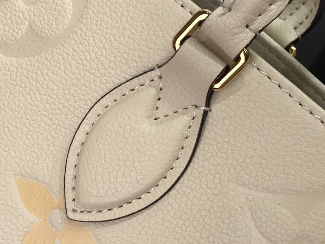 Louis Vuitton On the Go MM Monogram Empreinte Two-way Tote Replica Apricot M45717