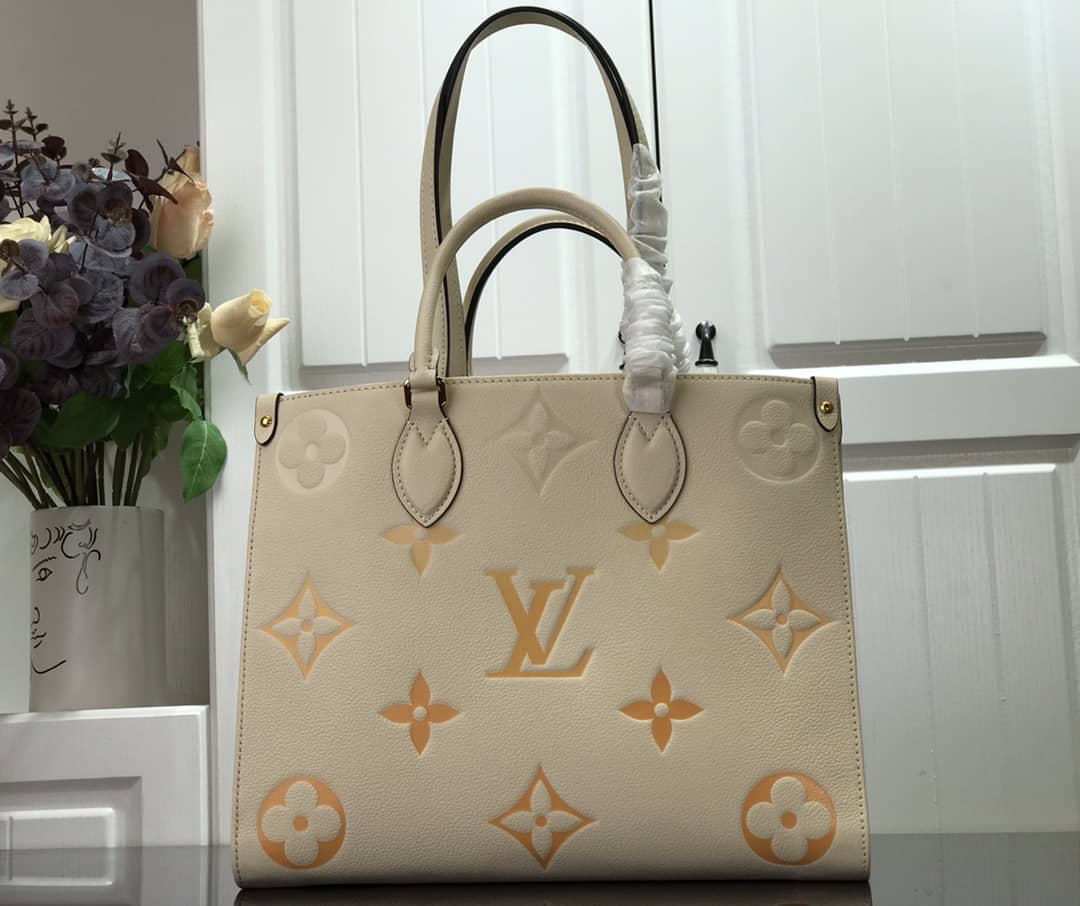 Louis Vuitton On the Go MM Monogram Empreinte Two-way Tote Replica Apricot M45717