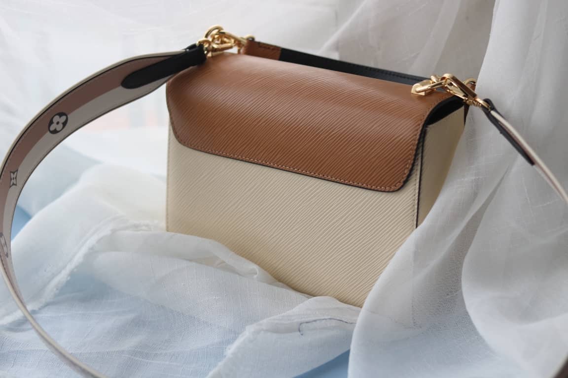 Louis Vuitton Textured Epi Leather Twist Series Bag Brown