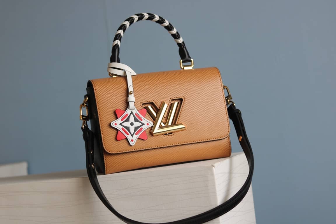 Louis Vuitton Textured Epi Leather Twist Series Bag Brown