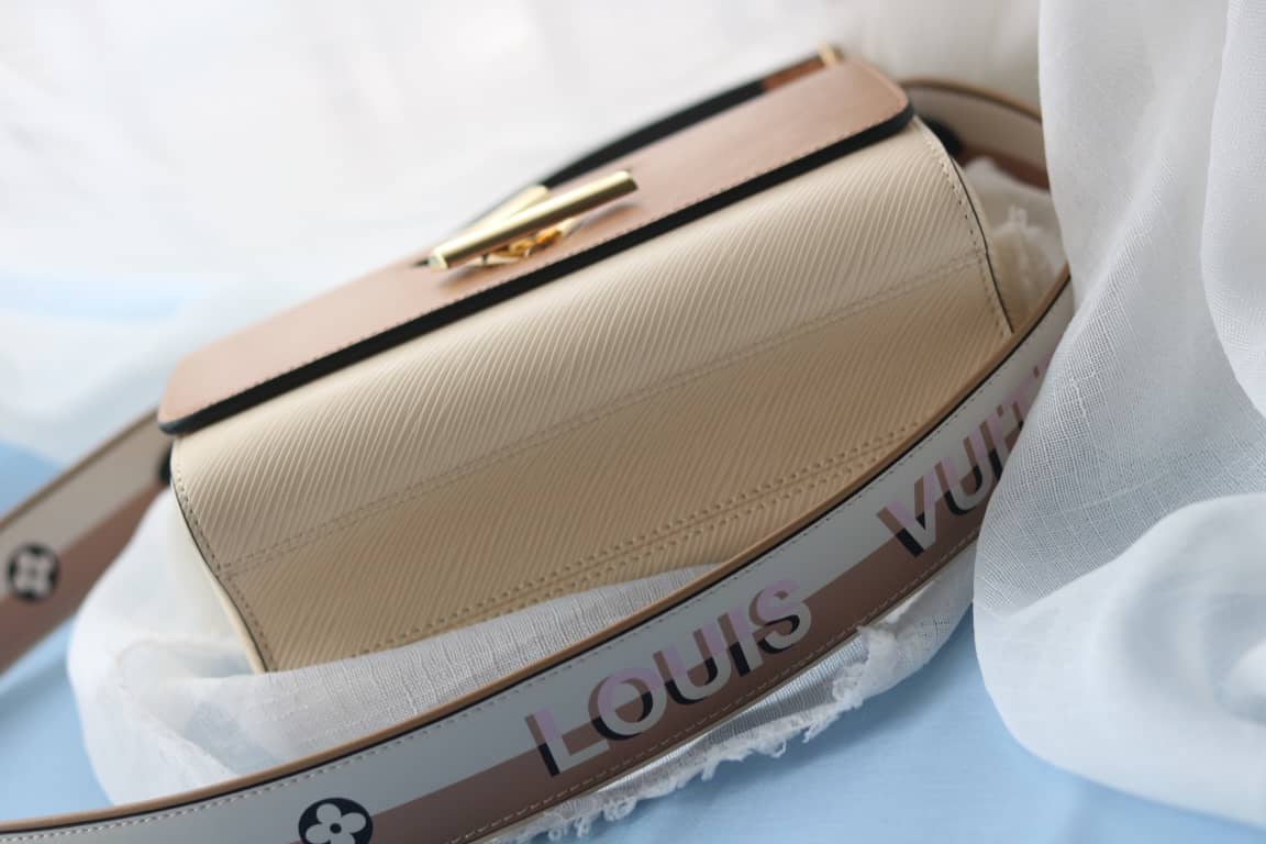 Louis Vuitton Textured Epi Leather Twist Series Bag Brown