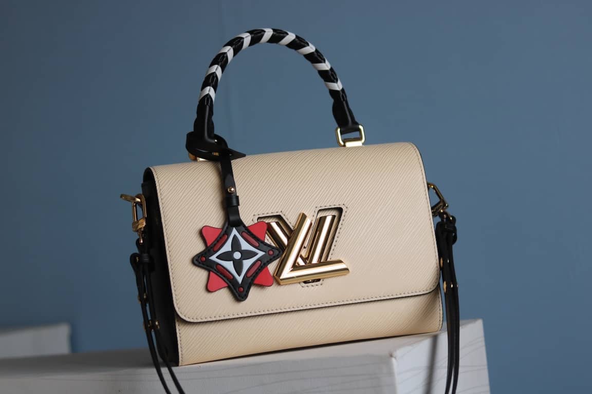 Louis Vuitton Textured Epi Leather Twist Series Bag Beige
