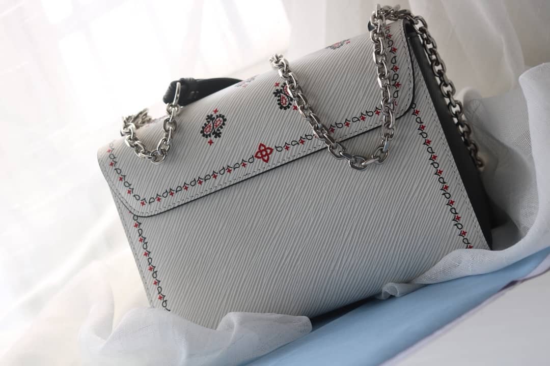 Louis Vuitton Textured Epi Leather Twist Series Bag White